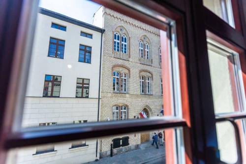 a view of a building from a window at Planetarium - Stare Miasto, Parking Free in Toruń