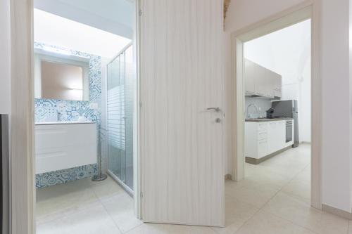 Kuchyň nebo kuchyňský kout v ubytování Vico Genova Wifi, AC, 4 persone - 10km Gallipoli