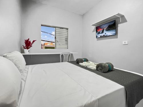 Postel nebo postele na pokoji v ubytování Plaza Shopping Coworking Fully Equipped