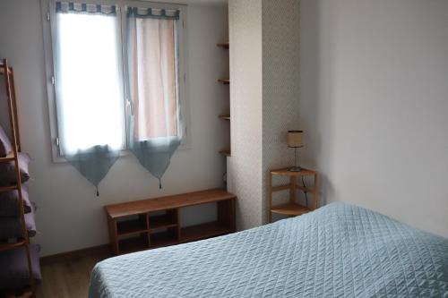 Ένα ή περισσότερα κρεβάτια σε δωμάτιο στο Estaque Cozy nest with a magical view of the sea