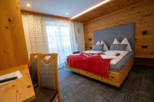 Postel nebo postele na pokoji v ubytování Haus Höllwart