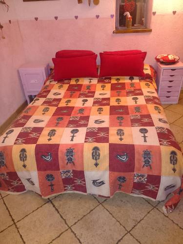 Postel nebo postele na pokoji v ubytování camera per 2 persone con il cuore in relax