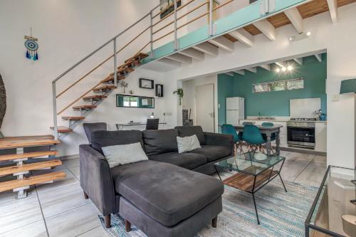 a living room with a couch and a table at Sitatunga Guest Lodge in Johannesburg