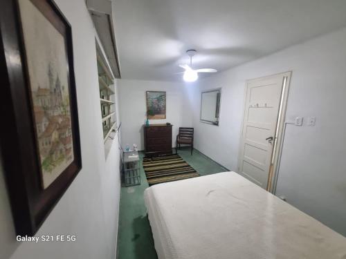 Postel nebo postele na pokoji v ubytování Cosme Velho - Rooms CORCOVADO STATION