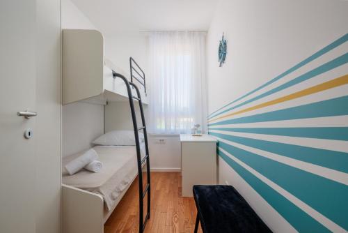 a small room with a bunk bed and a mural at Split For You - 2BR Apartment with Free Garage Parking in Split