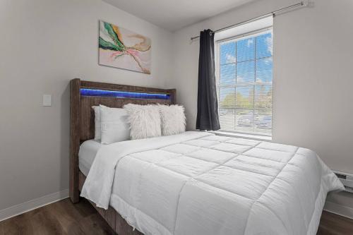 Ένα ή περισσότερα κρεβάτια σε δωμάτιο στο Classic 2BR Detroit Sugar Hill