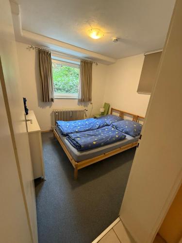 Кровать или кровати в номере Haus Freigeist