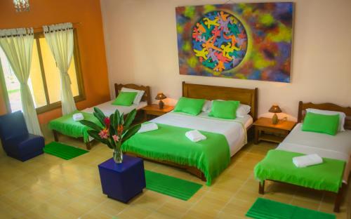 Кровать или кровати в номере Cabañas Yakuruna