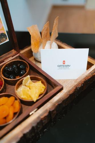 a tray with different types of food on a table at Gateway Aurangabad - Chhatrapati Sambhaji Nagar in Aurangabad