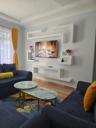 Χώρος καθιστικού στο Neim Homes