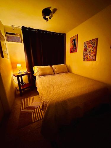 Postel nebo postele na pokoji v ubytování Apartamento Único en Caracas 3 habitaciones, 3 baños, terrazas, hamaca, estacionamiento, smartv, wifi y una decoración brutal estilo Art Déco - Moderno