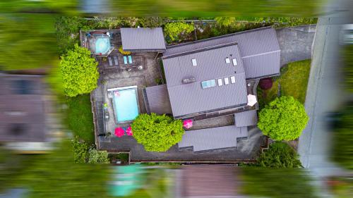 an overhead view of a building with a pool at The Lions Self Contained Suite, Shared Pool, Hot Tub, Views in North Vancouver