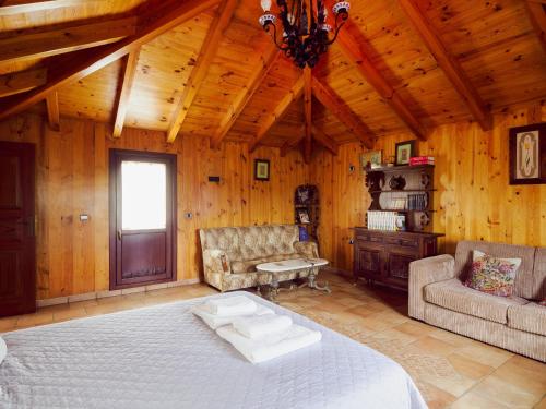 Postel nebo postele na pokoji v ubytování Cubo's Villa Fina & Minigolf included