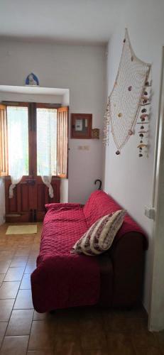 Postel nebo postele na pokoji v ubytování Appartamento in casa con cortili ad Arbus - Sardegna
