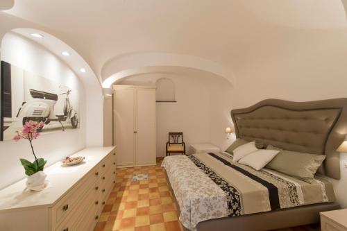 Postelja oz. postelje v sobi nastanitve Golden Vaults Praiano