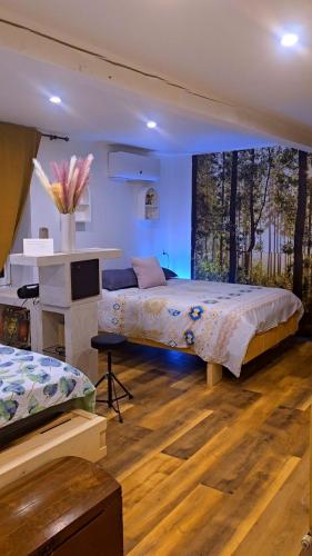 Postel nebo postele na pokoji v ubytování Grand gîte atypique