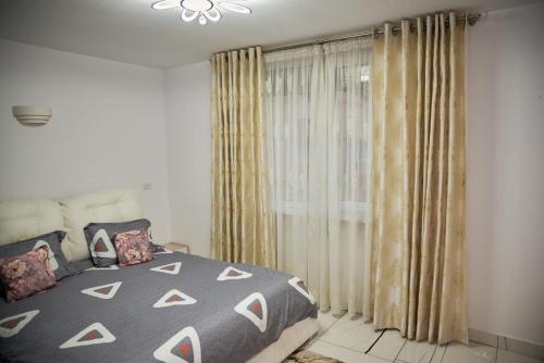 Katil atau katil-katil dalam bilik di Apart Hotel Center Luxury