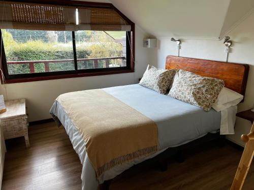 Postel nebo postele na pokoji v ubytování Agua y Campo Hotel Boutique