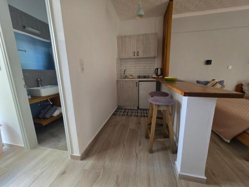 Postel nebo postele na pokoji v ubytování Mina Studios
