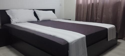 Katil atau katil-katil dalam bilik di Private Rooms Kranevo