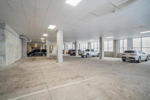 a large empty parking lot with cars parked in it at Holland Loft in Holland
