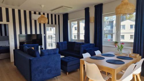 Χώρος καθιστικού στο Apartamenty Róża Wiatrów 45B z dużym tarasem