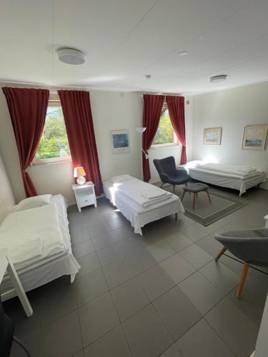 Postel nebo postele na pokoji v ubytování Fleninge Classic Motel