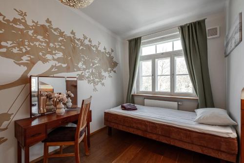 Postel nebo postele na pokoji v ubytování AirHome - Owl's Nest