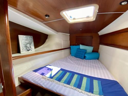 a small bed in the back of a boat at Alion Yacht in Altea