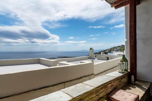 a balcony with a view of the ocean at Sea view house , for 5 persons in Triandaros in Triandáros