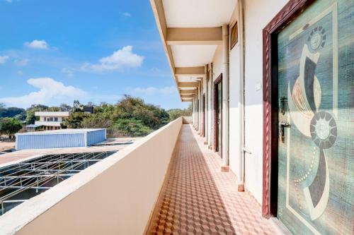 a corridor on the roof of a building at Hotel O Star Inn in Hyderabad