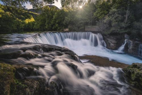 a waterfall in the middle of a river at Dolce Vita in Saint-Laurent-le-Minier