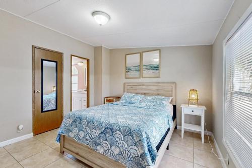 Postel nebo postele na pokoji v ubytování White Palm