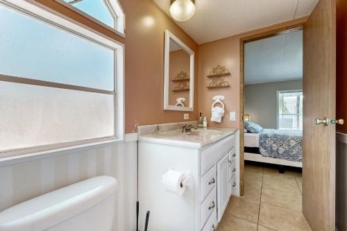 Postel nebo postele na pokoji v ubytování White Palm