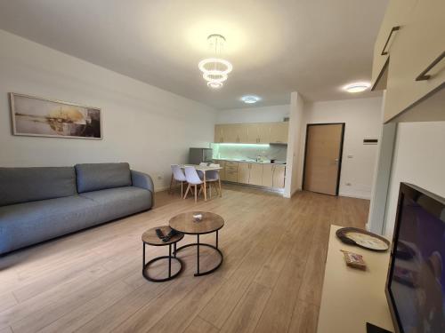 TV a/nebo společenská místnost v ubytování Kien apartment