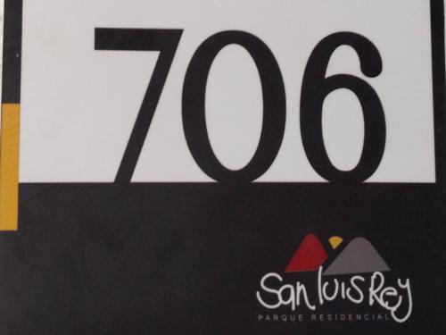 a sign for a restaurant with the number at Apartamento Norte de Armenia Salida para Salento y Filandia in Armenia