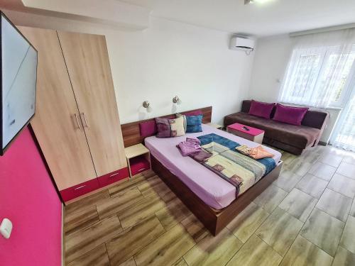 Postel nebo postele na pokoji v ubytování Vila Aleksandra 2 Studio 9