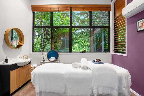 Katil atau katil-katil dalam bilik di Azabu Retreat & Spa