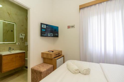 TV a/nebo společenská místnost v ubytování Hotel Shkodra Comfort