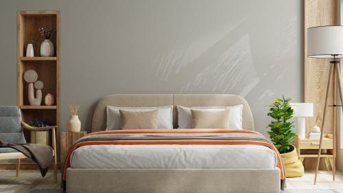 une chambre avec un lit et un mur dans l'établissement Ma Maison, à Melesse