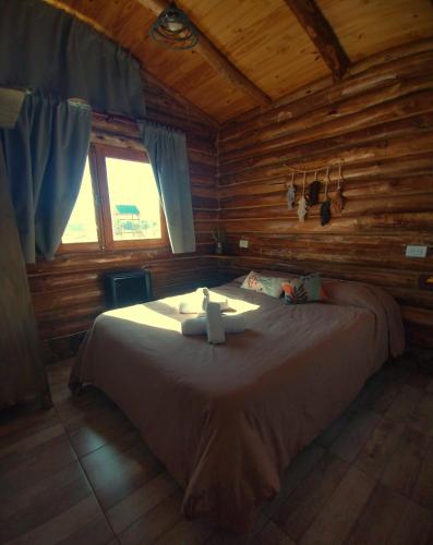 Letto o letti in una camera di Cabañas Tierra Adentro