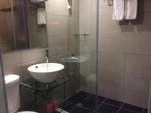 Koupelna v ubytování 紫園旅社Purple Garden Hotel