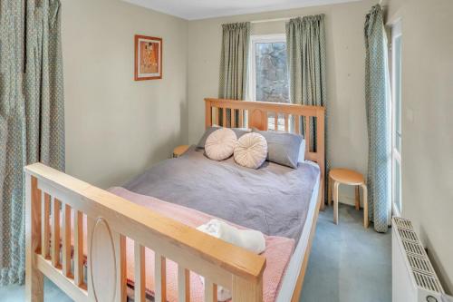 Postel nebo postele na pokoji v ubytování Whistler 1C