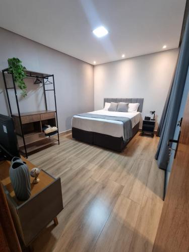 Postel nebo postele na pokoji v ubytování Casa Aconchegante com Hidro Centro Betim