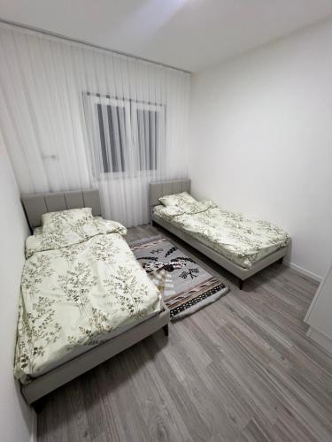 Ένα ή περισσότερα κρεβάτια σε δωμάτιο στο The Modern City