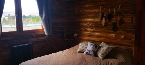 Letto o letti in una camera di Cabañas Tierra Adentro