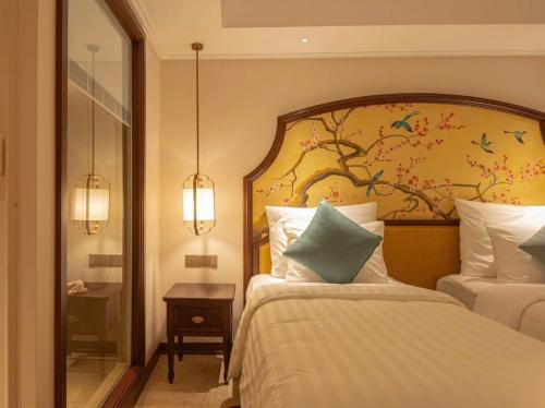 A bed or beds in a room at FLC Sea Tower QUY NHƠN-Khách Sạn 5 Sao-Hồ Bơi-View Biển-Trung Tâm Tp