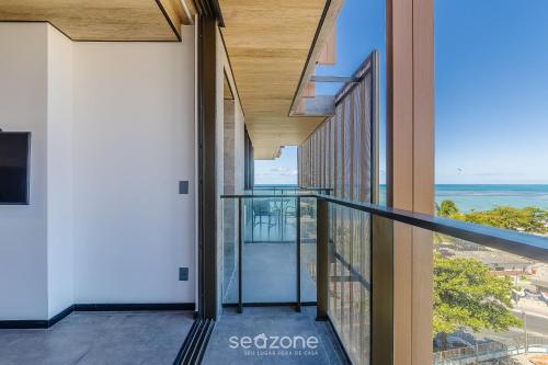 Un balcón o terraza en NWTs - Estudios con vista lateral al mar en Maceió III