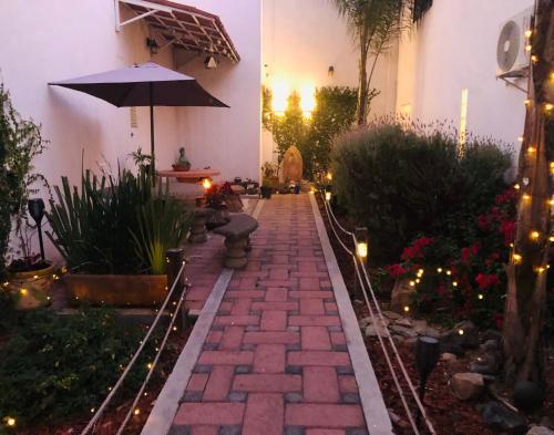 Κήπος έξω από το Villa Las Campanas