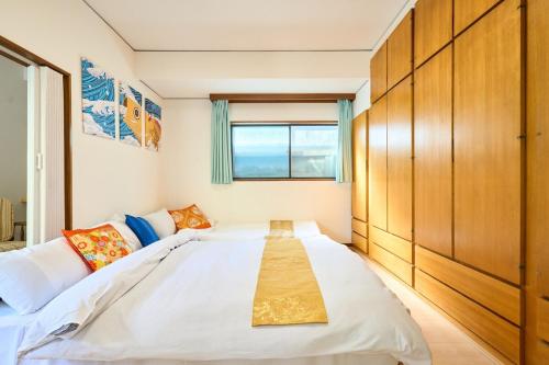 Ένα ή περισσότερα κρεβάτια σε δωμάτιο στο Comfy Home Komae, 20min to Shinjuku
